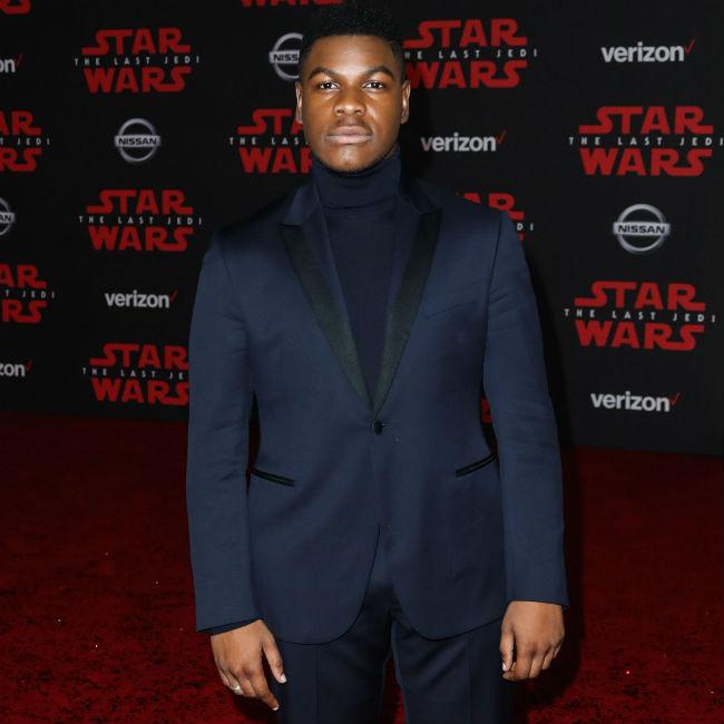 John Boyega is sad to say goodbye to Star Wars